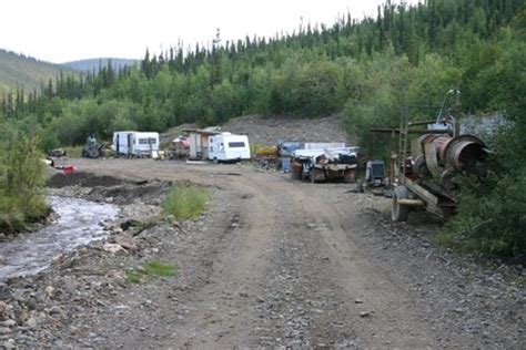 Tourists preparing to go underground. . Alaska gold claims for sale